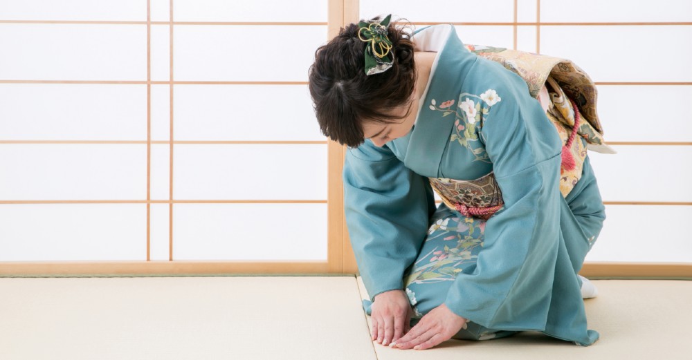 Bowing while kneeling is a common display of welcome or appreciation.