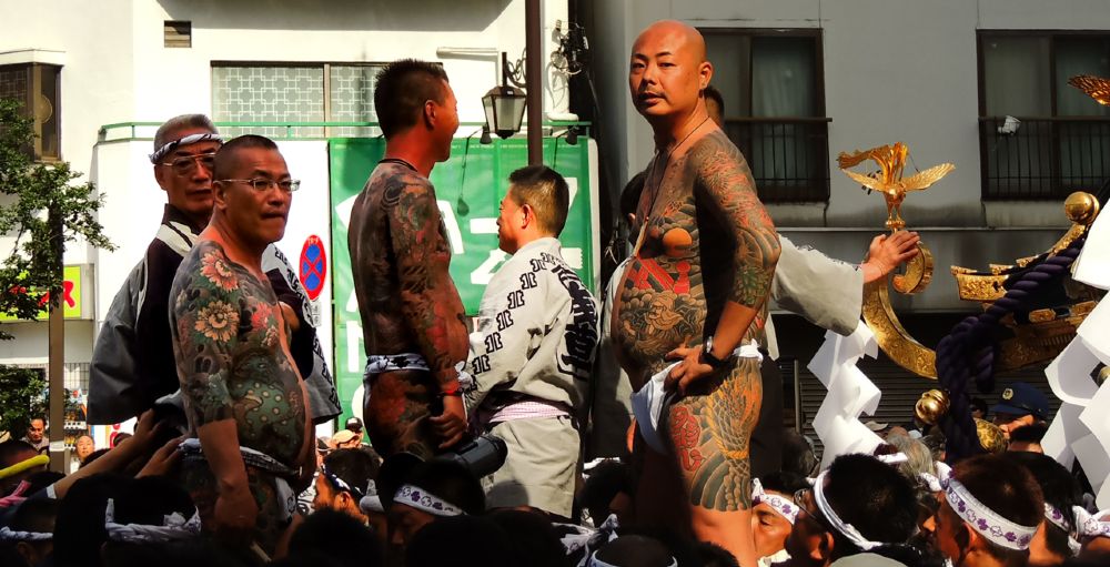 Gambling is often associated with the Yakuza, recognizable by their extensive tattoos.